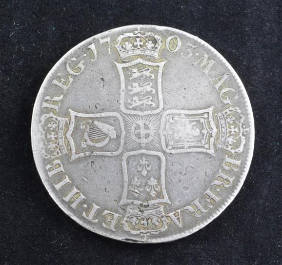 A Queen Anne silver crown, first bust Vigo 1703,